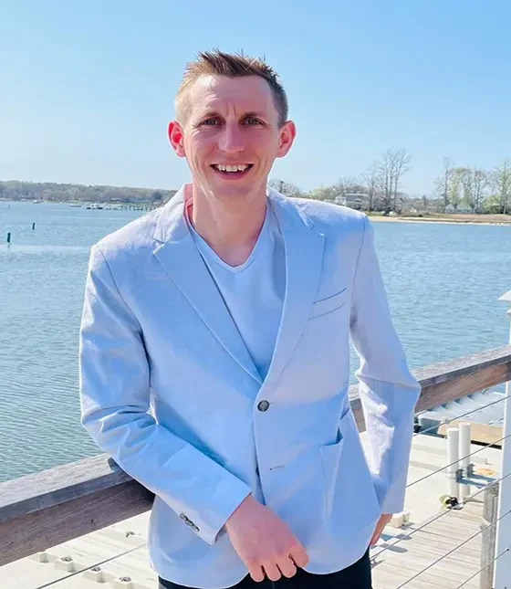 Kohl in a light blue blazer
